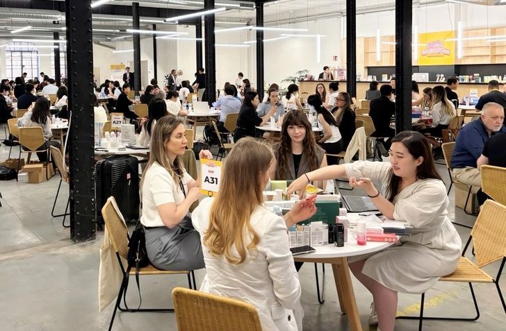 Officials from Korean companies participating in the 2026 Lotte-Korea Brand Expo engage with local buyers during the event held from May 27-29 in Madrid. Courtesy of Lotte Corp.