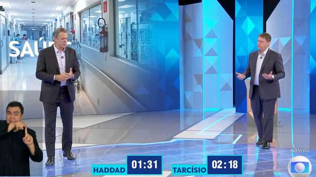 Bastidores de debate entre Tarcísio e Haddad teve risada por 'torta de climão', apoiadores de só um lado e imprensa isolada