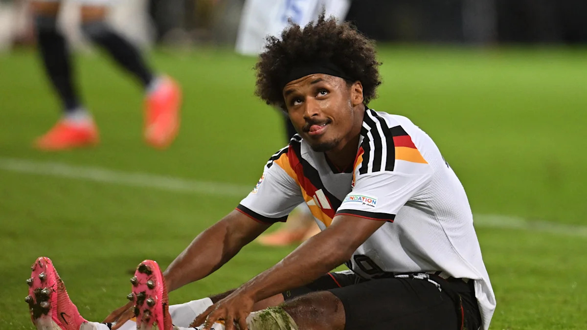 27 September 2026, Bavaria, Augsburg: Soccer, Men, Nations League A, Germany vs. Greece, Group 2, Matchday 2, WWK Arena, Karim Adeyemi (Germany) reacts. Photo: Sven Hoppe/dpa - IMPORTANT NOTICE: In accordance with the regulations of the Bundesliga and the DFB (German Football Association), it is prohibited to use or allow the use of photographs taken in the stadium and/or during the game in the form of sequential images and/or video-like photo series. (Photo by Sven Hoppe/picture alliance via Ge