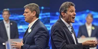 Tarcísio e Haddad durante o primeiro debate do segundo turno de 2022. Foto: Renato Pizzutto/Band/Divulgação / Estadão