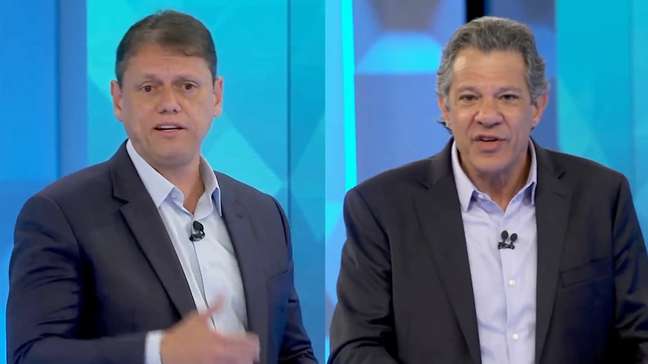 Bastidores de debate entre Tarcísio e Haddad teve risada por 'torta de climão', apoiadores de só um lado e imprensa isolada