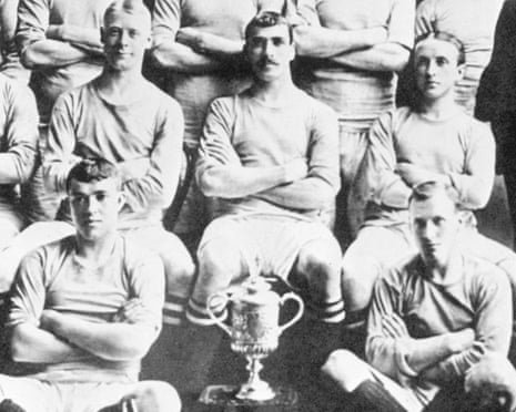 Manchester City's players, including their captain, Billy Meredith (second row, centre) pose for a team photo with the FA Cup to mark their winning the competition in 1904.
