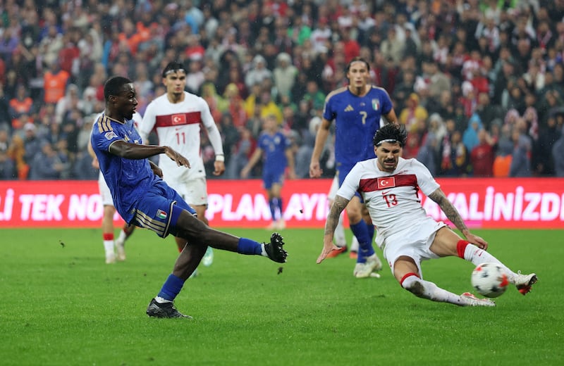Michael Kayode, left, capped an impressive display with Italy's third goal against Turkey. Reuters